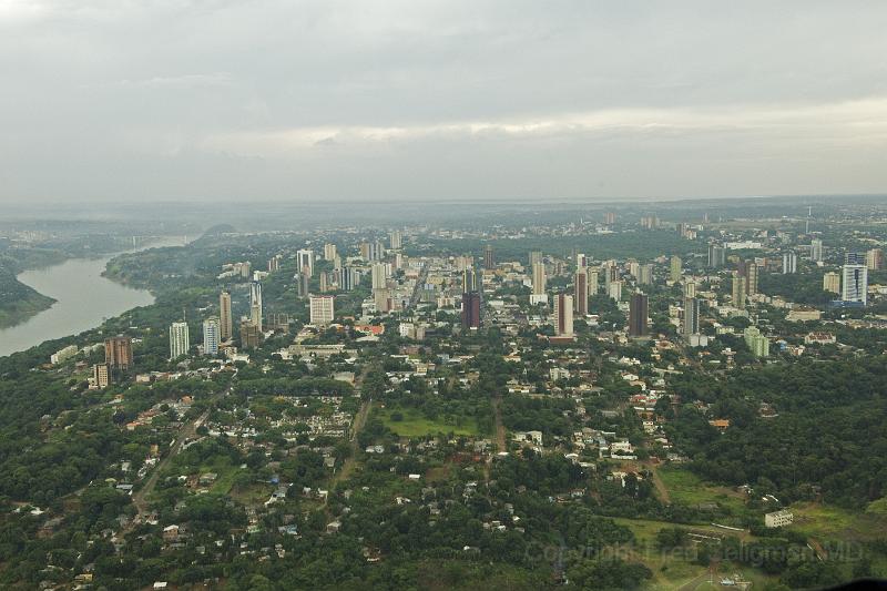 20071204_162957  D2X 4200x2800.jpg - The Friendship Bridge over the Parana River is distant left.  The City of Cuidid del Este, Paraguay is on the left,  Foz do Igaucu Brazil is on the right.  Many Brazilians work in Paraguay and buy things there because they are much cheaper.